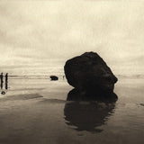 Beach rock with figures
